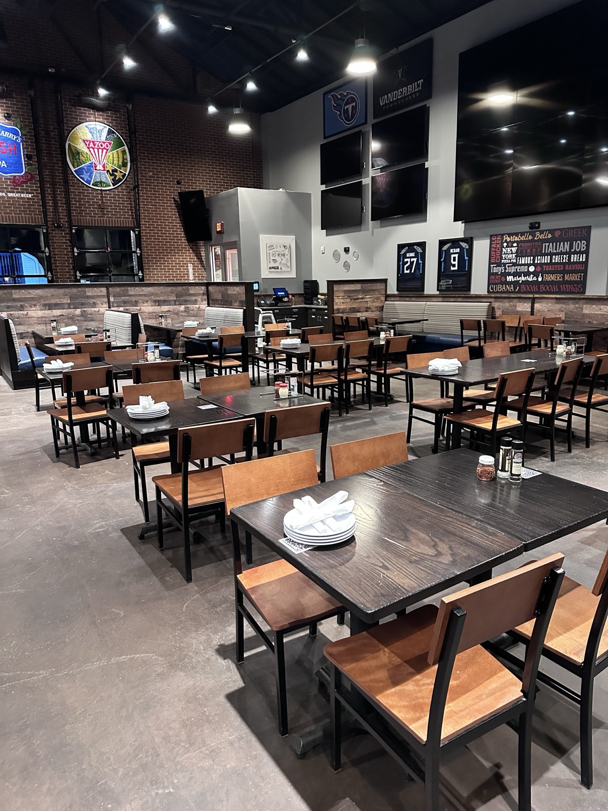 Nashville restaurant facility serviced by Ascent Cleaning Solutions — empty tables, polished floor, ready for service