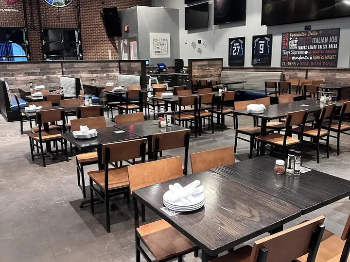 Nashville restaurant facility serviced by Ascent Cleaning Solutions — empty tables, polished floor, ready for service